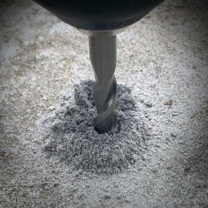 Concrete drill bit set for drilling into concrete