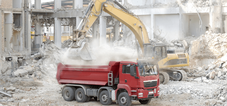 How to break concrete, Break up concrete with a digger